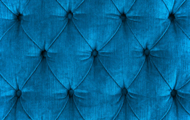 istock Close-up of a blue velvet sofa. 1209063113