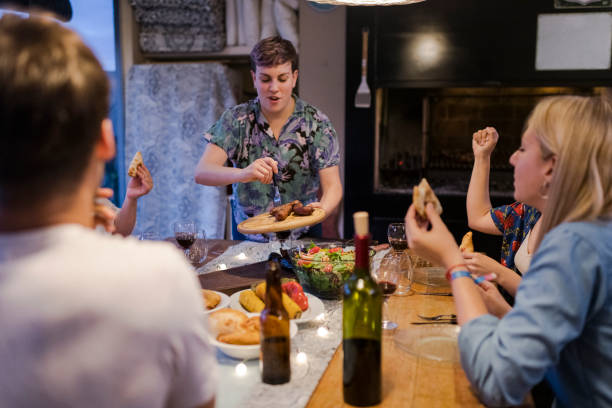 istock Chef presenting the meat to the table during asada 1209067929