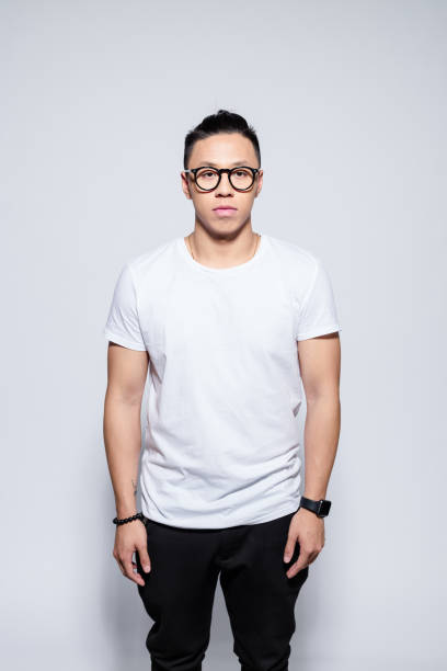 istock Confident asian young man wearing white t-shirt 1209075168