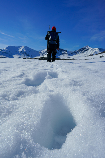 Man hiking in Spitsbergen Mountain scene of the Spitsbergen Mountains in Isfjord