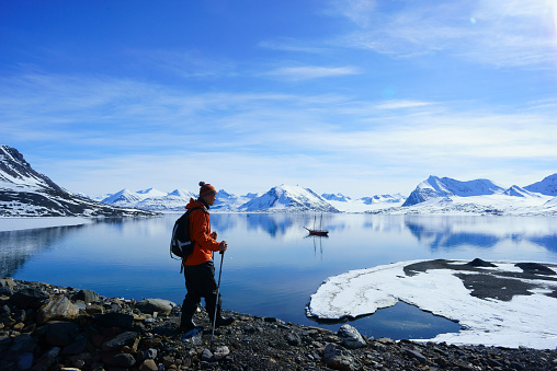 Man hiking in Spitsbergen Mountain scene of the Spitsbergen Mountains in Isfjord