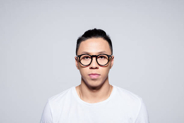 istock Handsome asian young man wearing glasses 1209076625