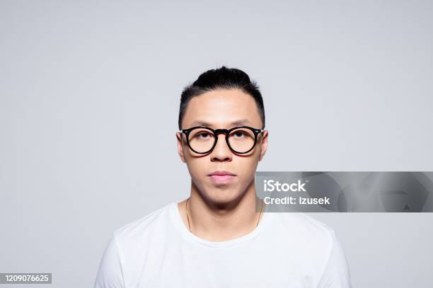 Handsome Asian Young Man Wearing Glasses Stock Photo - Download Image Now - Portrait, White Background, Asian and Indian Ethnicities
