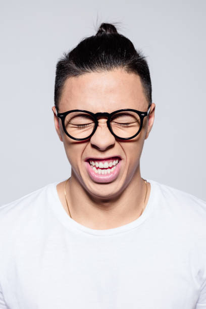 istock Headshot of happy asian young man 1209076904