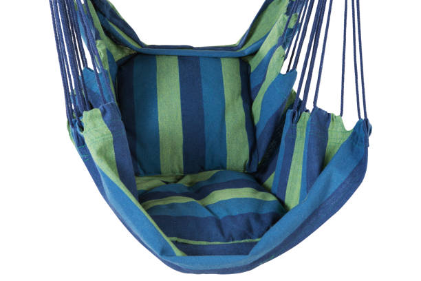 istock fabric hammock with blue and green stripes, on a white background, side view, close-up 1209079719