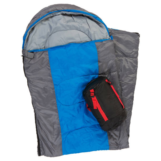 istock a sleeping bag with a blue stripe, folded in half, a sleeping bag in a cover lies on top, on a white background 1209079759