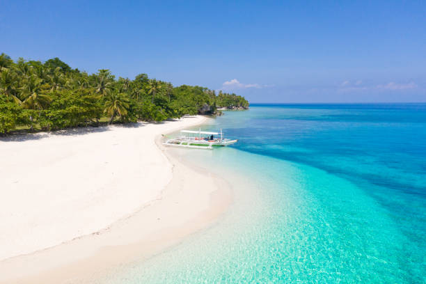 istock Tropical island with a white beach. Mahaba Island, Philippines. 1209079878