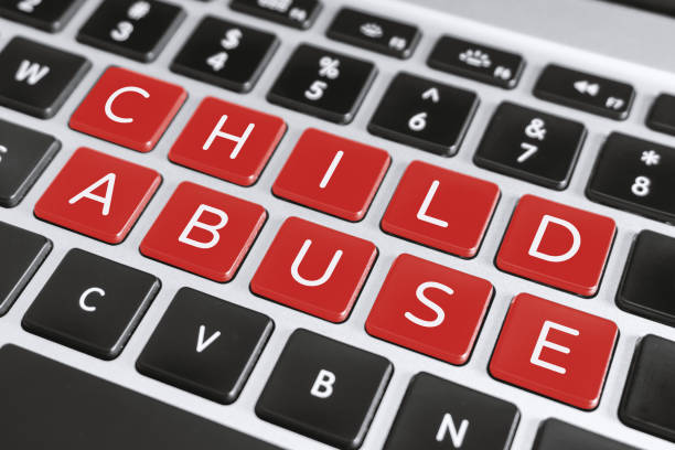 Child Abuse Word on Computer Keyboard stock photo