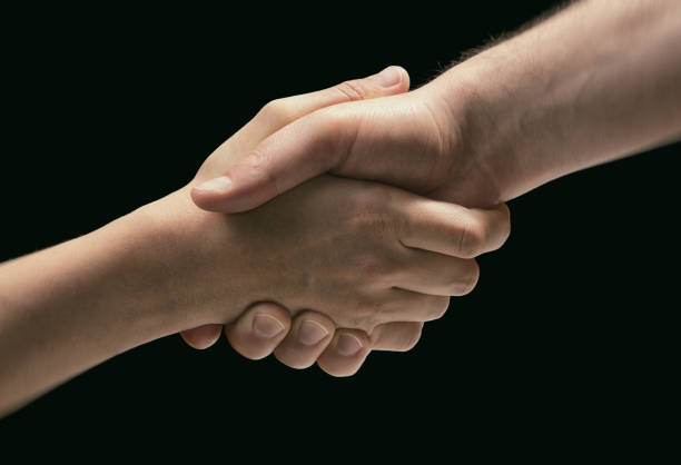 istock The hands of two people during the rescue. 1209081817