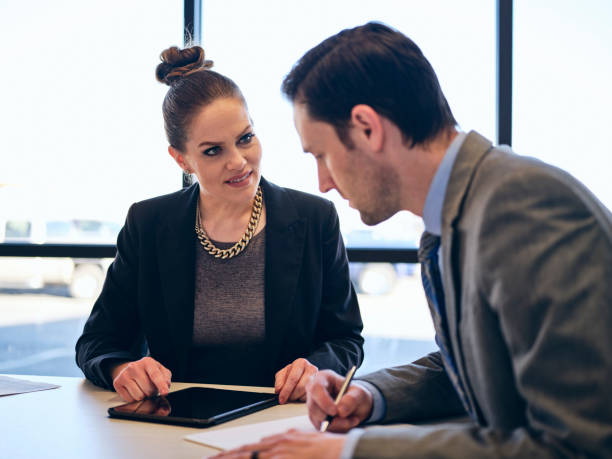 istock Financial Planner and Client in an Office 1209082810
