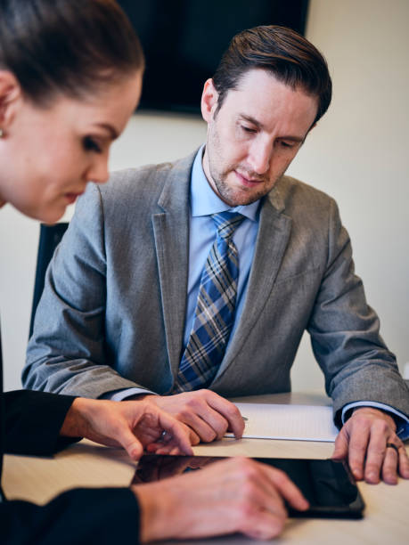 istock Financial Planner and Client in an Office 1209082865