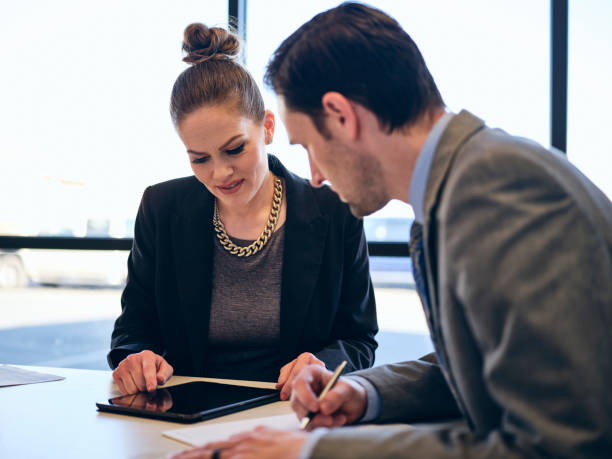 istock Financial Planner and Client in an Office 1209082891