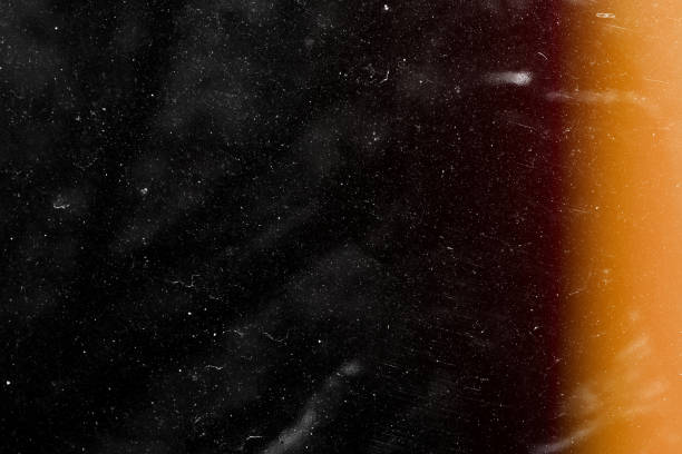 Light leak Film Grain Designed film texture background with heavy grain, dust and a light leak Real Lens Flare Shot in Studio over Black Background. Easy to add as Overlay or Screen Filter over Photos overlay film camera overlay stock pictures, royalty-free photos & images