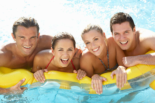 istock A group of young friends having fun in a pool 120908966