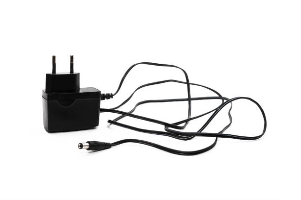 ブラック電源アダプタ - mobile phone charging power plug adapter ストックフォトと画像