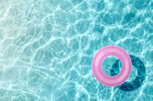 istock rubber ring in the swimming pool sunny day. 1209090947