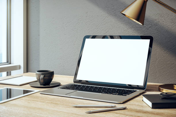istock laptop and tablet on wooden office 1209095144