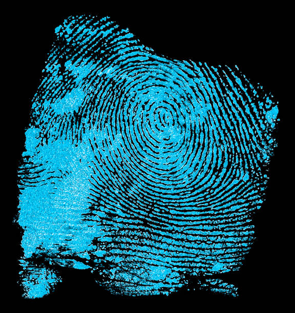 istock Fingerprint on black background. Fingerprint with ultraviolet lamp. 1209098056