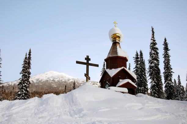 Orthodox chapel in the winter forest. Kuznetsk Alatau, Russia. January 2018