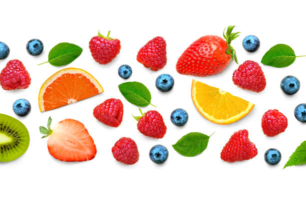 istock Fruit and berry pattern of various ripe berries isolated on white background. Fruit border frame banner. Flat lay. 1209101817