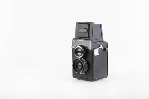 istock The old medium format film TLR camera on white background. 1209103158