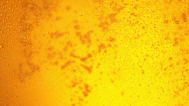 Detail of beer drink with bubbles, super macro shot