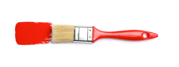 istock Brush with red paint isolated on white background 1209105863
