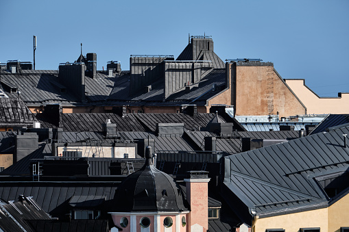 Black roofs of old buildings in Helsinki, Finland.