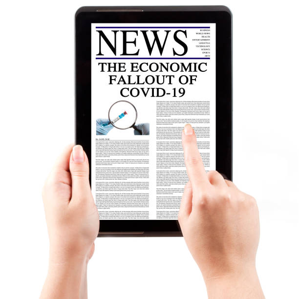 istock Economic Fallout of COVID-19 Digital News on Tablet Computer 1209110504