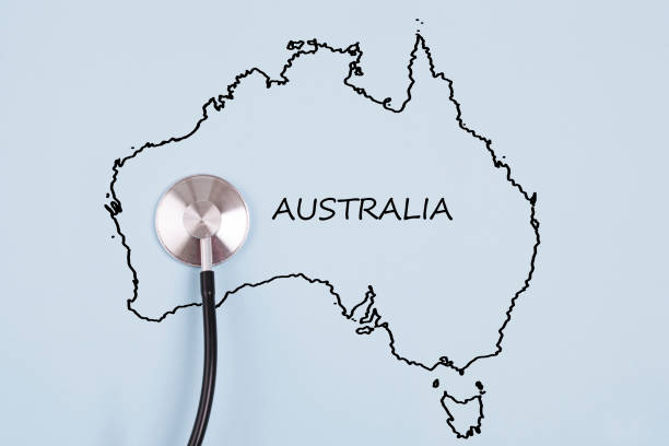 Map of Australia with stethoscope on blue background