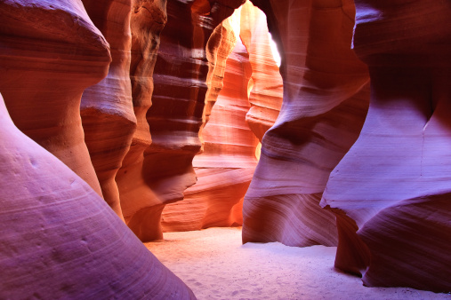 Antelope Canyon is the most famous slot canyon in the world. It is shaped by millions of wind and water erosion.  It is one of the most stunning natural wonders in the United States and a popular destination for tourists who love hiking, photography  and taking in the unique and other worldly nature of the canyons.