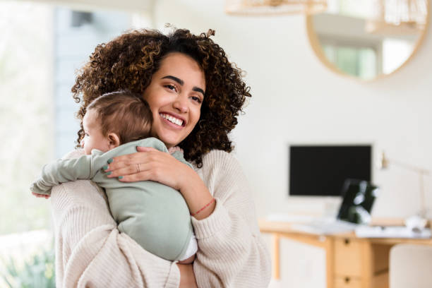 istock Cheerful mom with adorable infant son 1209117963