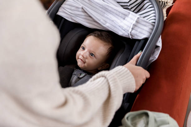 istock Adorable baby boy in car seat 1209117982