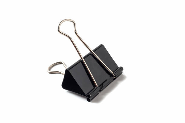 istock Black metal binder clip on white background isolated. 1209121469