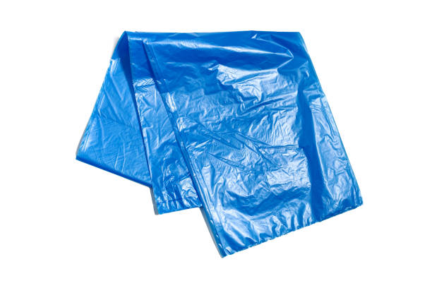 istock Blue plastic garbage bag isolated on the white background. 1209121536