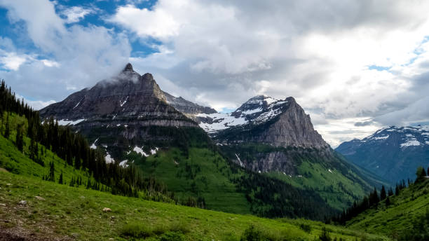 istock storm clouds clearing from mt oberlin at glacier national park 1209123372