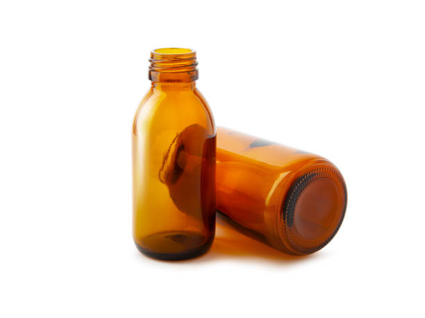 istock Two medicine bottles close up isolated on white 1209124437