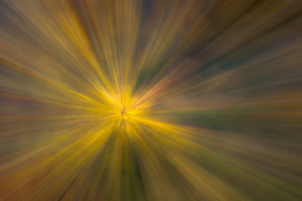 istock autumn forest on a bright sunny day. Abstract photo. Colorful textured background. long shutter speed. 1209126510