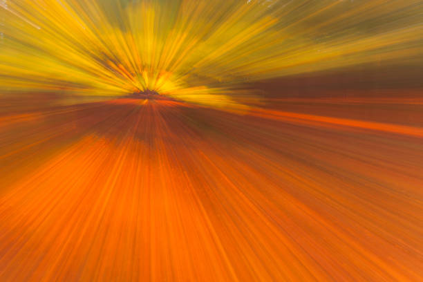 istock autumn forest on a bright sunny day. Abstract photo. Colorful textured background. long shutter speed. 1209126554