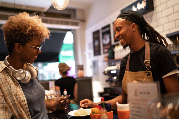 istock Customer being served by the waiter 1209130535
