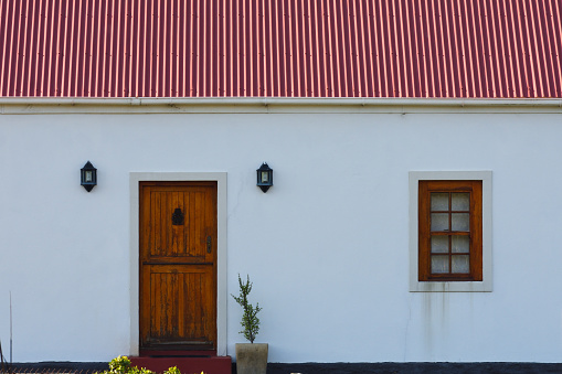 The front exterior of a simple small town cottage, Mossel Bay, South Africa