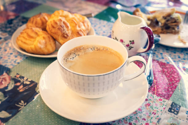 istock capuchino coffee on vintage style table 1209140111