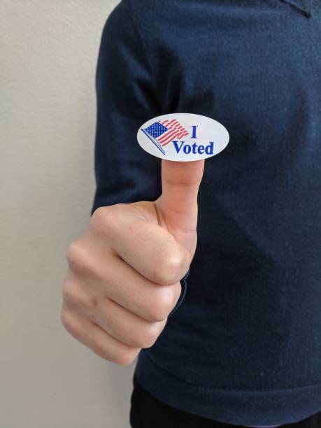 istock Voter holding up an 