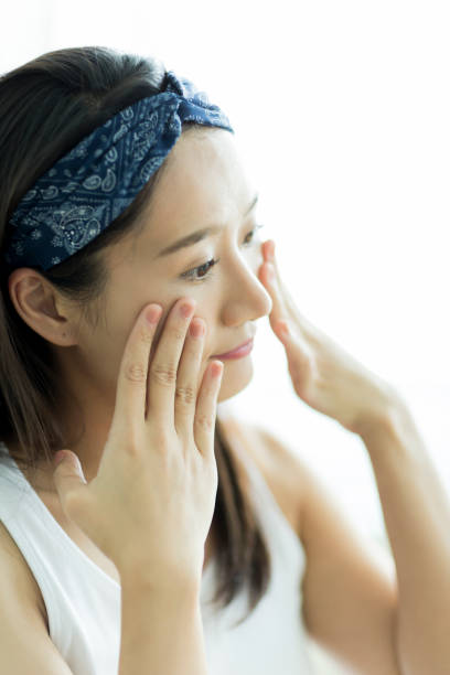 istock Young woman caring for skin 1209141348