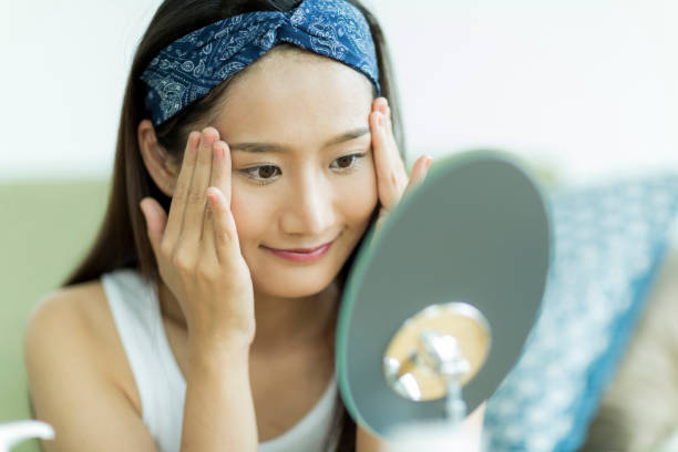 istock Young woman caring for skin 1209141351