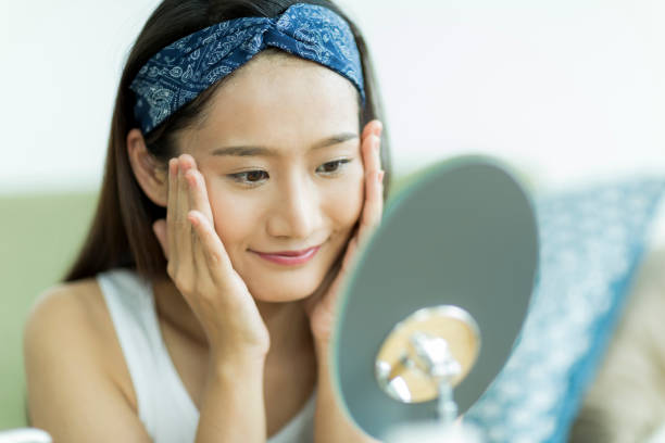 istock Young woman caring for skin 1209141382