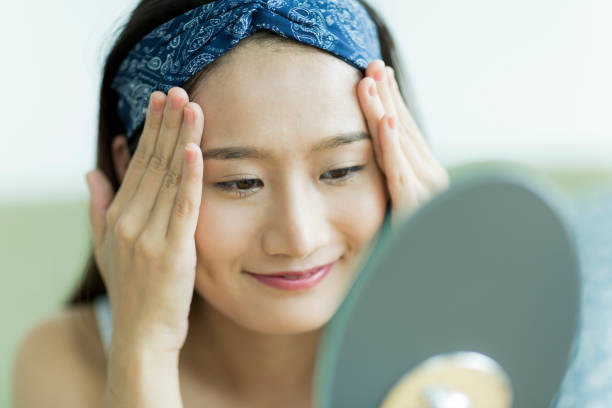 istock Young woman caring for skin 1209141413