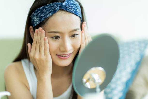 istock Young woman caring for skin 1209141429
