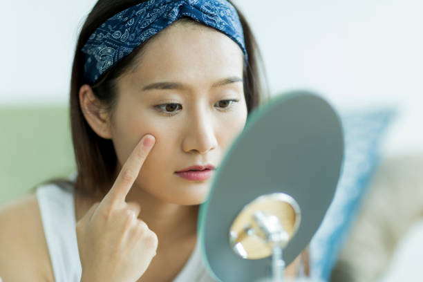 istock Young woman caring for skin 1209141441