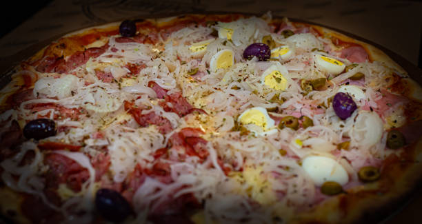 istock Pepperoni and Portuguese Pizza 1209144042
